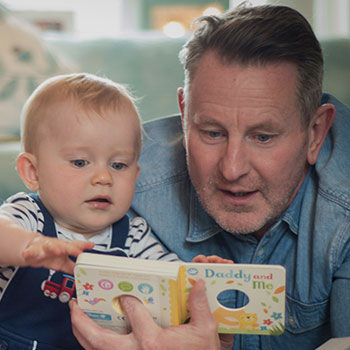 3-dad-reading-to-babyT